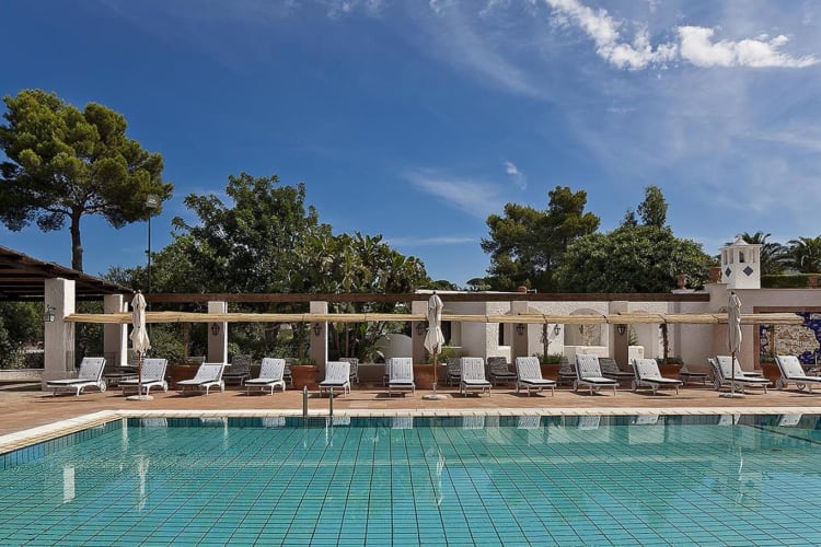 Outdoor pool with seating